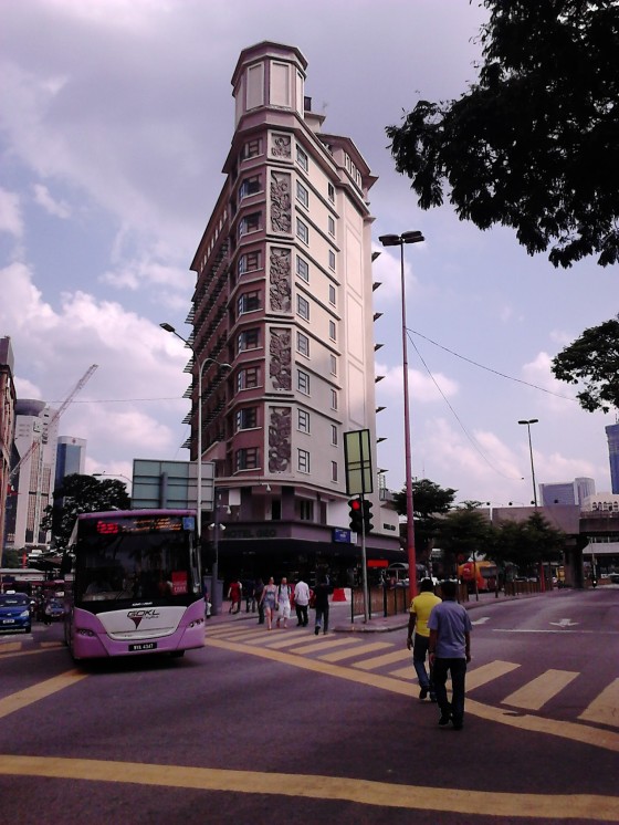 A purple-line GoKL bus passing by